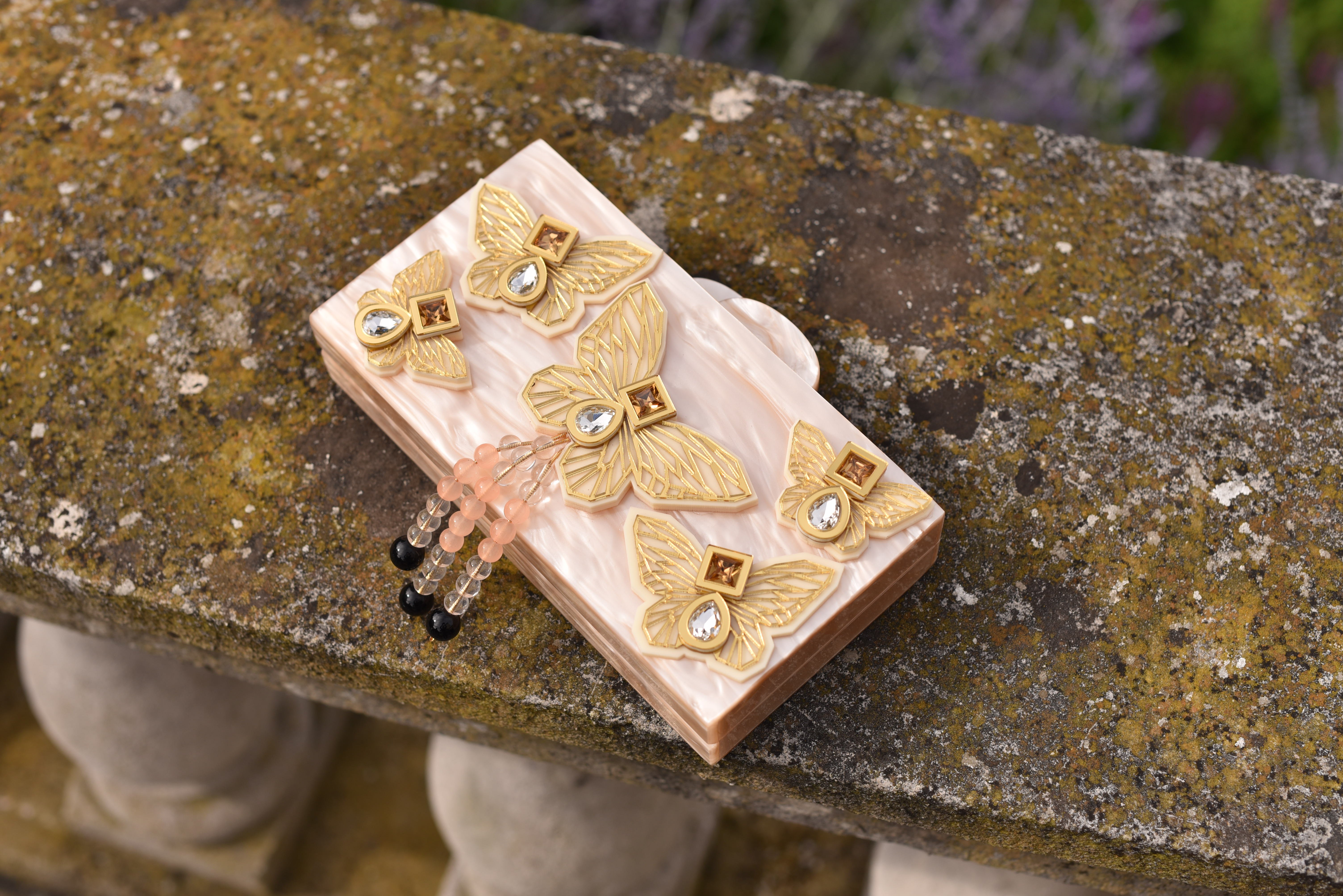 THE CREME BUTTERFLY CLUTCH 